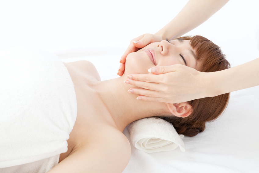 Beautiful young woman in spa. Portrait of asian.